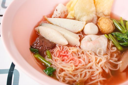 egg noodles soup with fish ball and morning glory