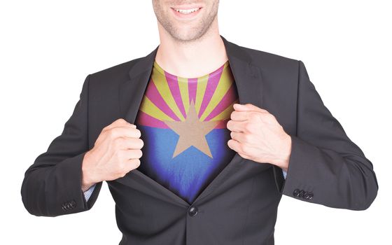 Businessman opening suit to reveal shirt with state flag (USA), Arizona