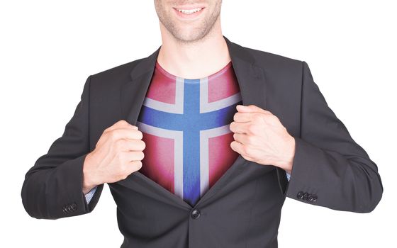 Businessman opening suit to reveal shirt with flag, Norway