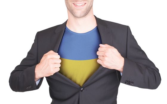 Businessman opening suit to reveal shirt with flag, Ukraine