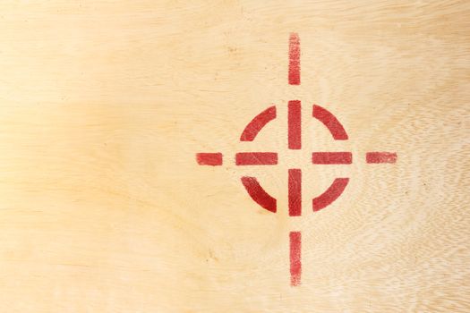 Target symbol on wood and space