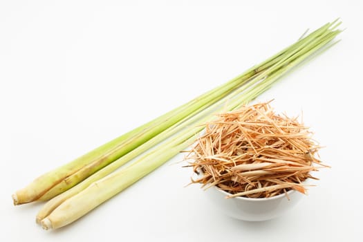 fresh and dried lemongrass on white background