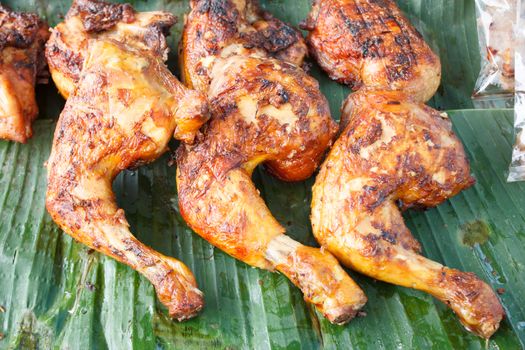 Grilled chicken on banana leaves - Thai style