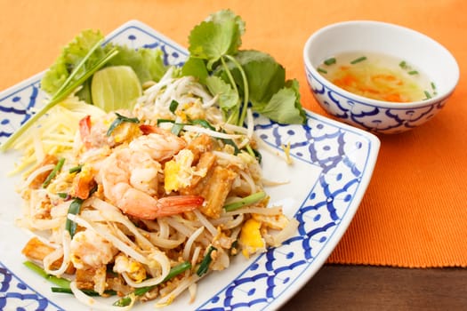 stir-fried rice noodles with shrimp (Pad Thai)
