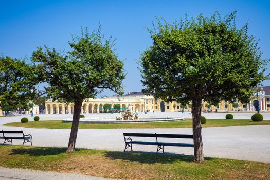 VIENNA, AUSTRIA - AUGUST 4, 2013: Schonbrunn Palace royal residence garden with fountain sculpture on August 4, 2013 in Vienna, Austria.