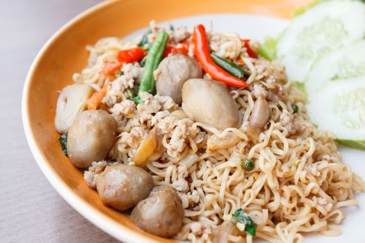 stir fried  spicy  noodle with pork and straw mushroom (thai food)