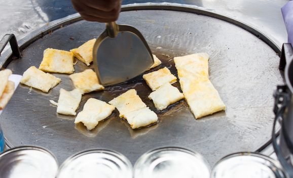 roti with frying on pan