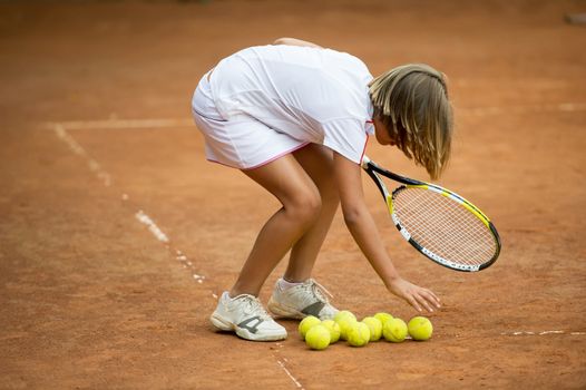 Children at school during a dribble of tennis