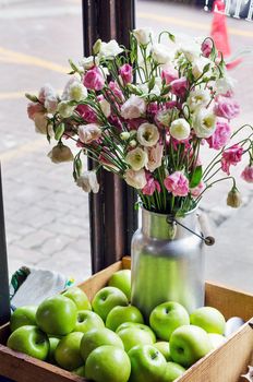 Beautiful bouquet of pink roses and white roses in a decorative bucket 