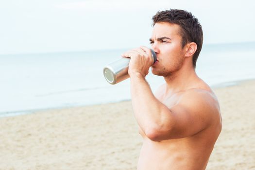 Lifeguard, summer. Handsome man on the beach