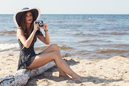 Beauty, summer. Cute, attractive woman on the beach