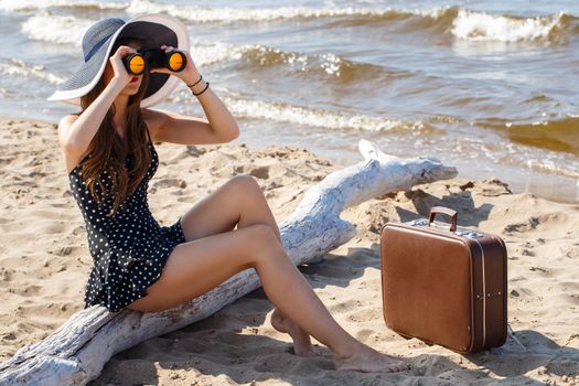 Beauty, summer. Cute, attractive woman on the beach