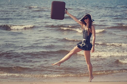 Beauty, summer. Cute, attractive woman on the beach