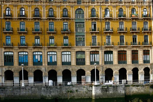 Cityscape of beautiful modernist building in Bilbao Bailen Street next to the Nervion river Basque Country Spain