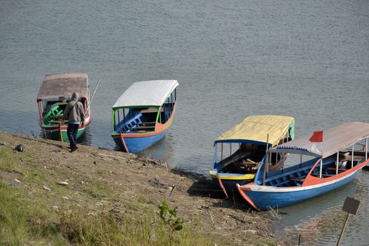 padalarang, indonesia-august 1, 2014: boat that people used for fishing at saguling lake padalarang, west java-indonesia.