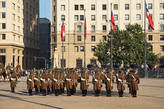 Members of the Carabineros parading as part of the changing of the guard ceremony at La Moneda in Santiago, Chile