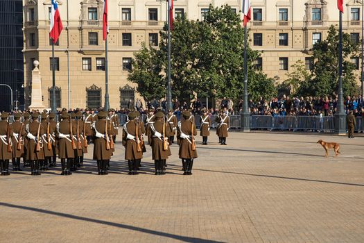 Members of the Carabineros parading as part of the changing of the guard ceremony at La Moneda in Santiago, Chile