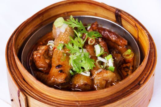 Single chicken feet dimsum on white background