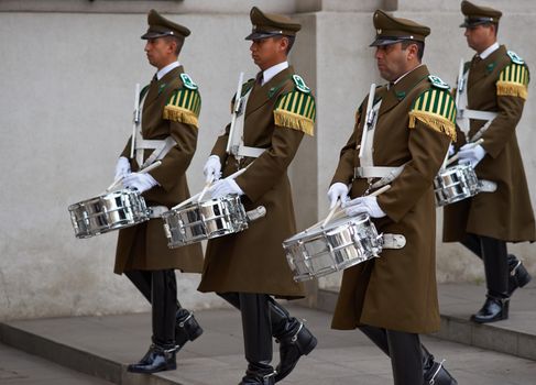 Members of the Carabineros Band marching as part of the changing of the guard ceremony at La Moneda in Santiago, Chile