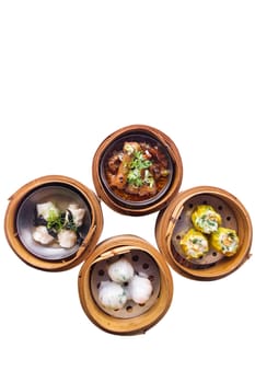 Various Dim Sum in Bamboo Steamed Bowl isolated white background