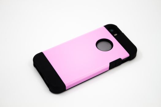 Smartphone with pink case isolated on white background, stock photo