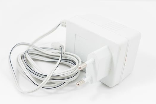 White adapter isolated on white background, stock photo