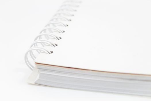 Closeup spiral notebook isolated on white background, stock photo