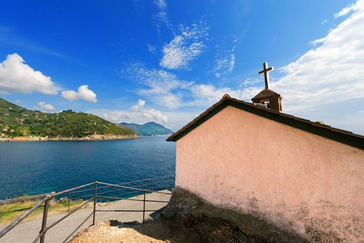 Church of Madonnina della Punta with the Ligurian sea and the cliffs. Near Bonassola, ancient village, La Spezia, Italy