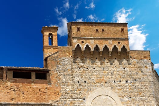 Detail of ancient Porta San Giovanni (1262), south entrance of the city of San Gimignano, Siena, Tuscany, Italy