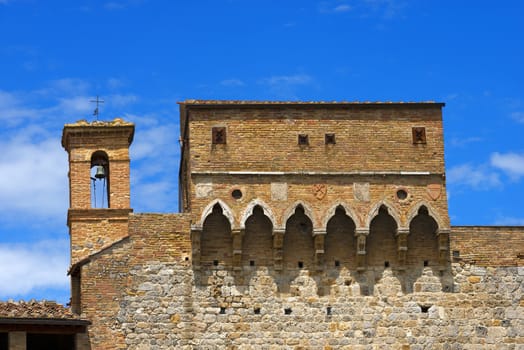 Detail of ancient Porta San Giovanni (1262), south entrance of the city of San Gimignano, Siena, Tuscany, Italy