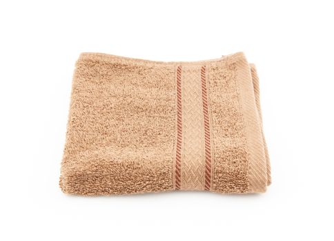 Brown towel on a white background
