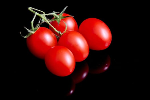 Tomatoes on black