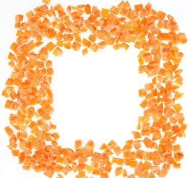 frame of frozen chopped carrots over white