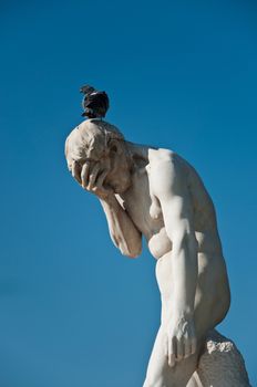 Statue in Tuileries garden in Paris