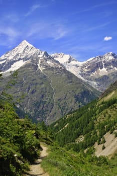 Amazing view of touristi trail near the Matterhorn in the Swiss Alps 