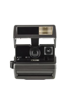 Vintage instant camera isolated on a white background