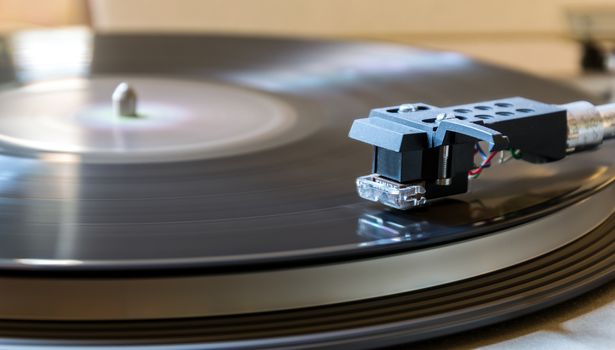 Modern record player with a vinyl