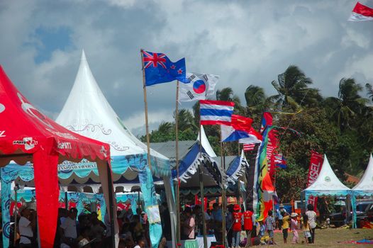 pangandaran, indonesia-july 16, 2011: participant booth at pangandaran international kite festival that held in east coast pangandaran beach, west java-indonesia.