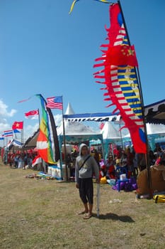 pangandaran, indonesia-july 16, 2011: participant booth at pangandaran international kite festival that held in east coast pangandaran beach, west java-indonesia.