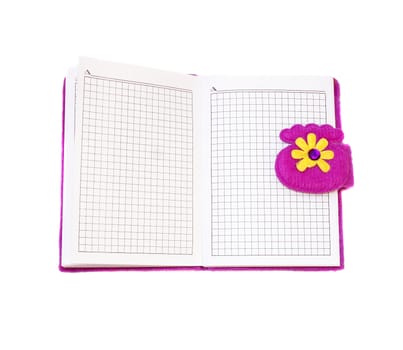 Open notebook in a purple cover on a white background