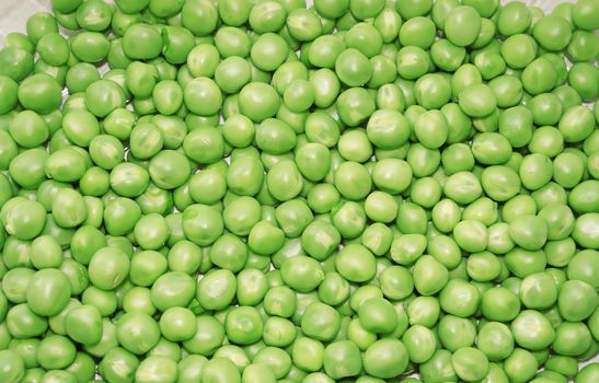Pea green peas as a background                               