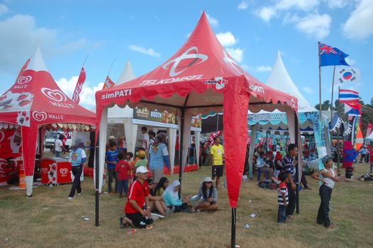 pangandaran, indonesia-july 16, 2011: participant booth at pangandaran international kite festival that held in east coast pangandaran beach, west java-indonesia.