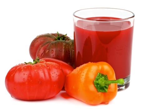 Various Tomatoes, Orange Bell Pepper and Glass of Freshly Squeezed Tomato Juice isolated on White background