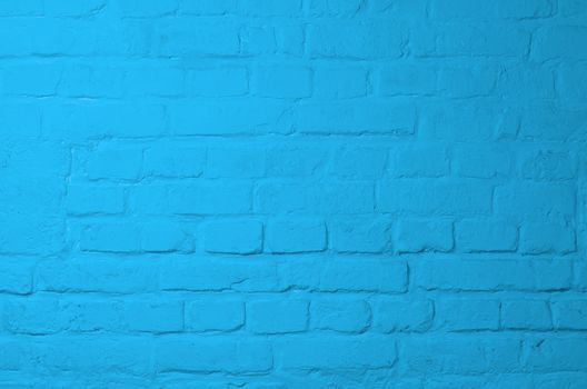 Background of Brick Wall Painted with Blue Mortar closeup