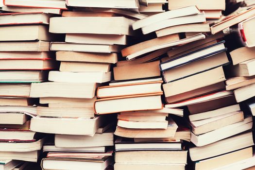 piles of old books in the flea market