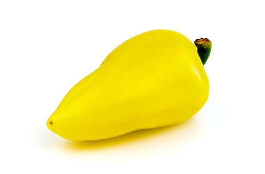 One yellow sweet pepper on a white background