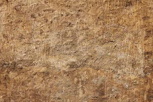 Rough brown plaster sandstone  wall coarse texture background