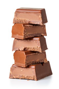 Stack of chocolate pieces on white background