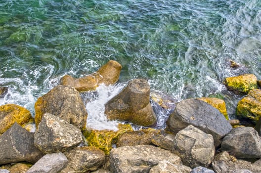 Sea waves breaking in rock coast, Black Sea.