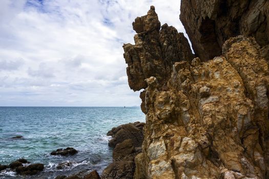 Coastal Cliffs on Koh Larn Beach. Island near Pattaya City, Thailand.